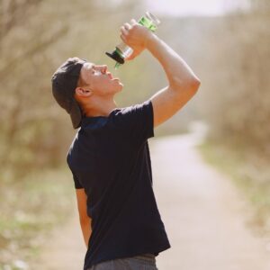 A man drinking water.